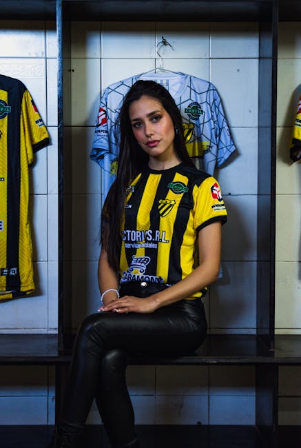 Female athlete in locker room preparation