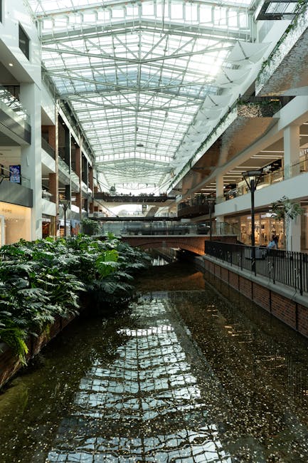 Modern indoor wellness atrium with greenery